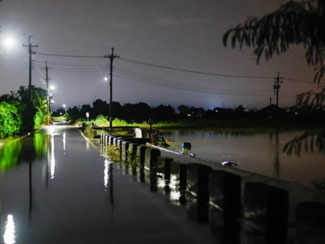 a driveway and a massive field area are flooded due to torrential rain photo anadolu agency